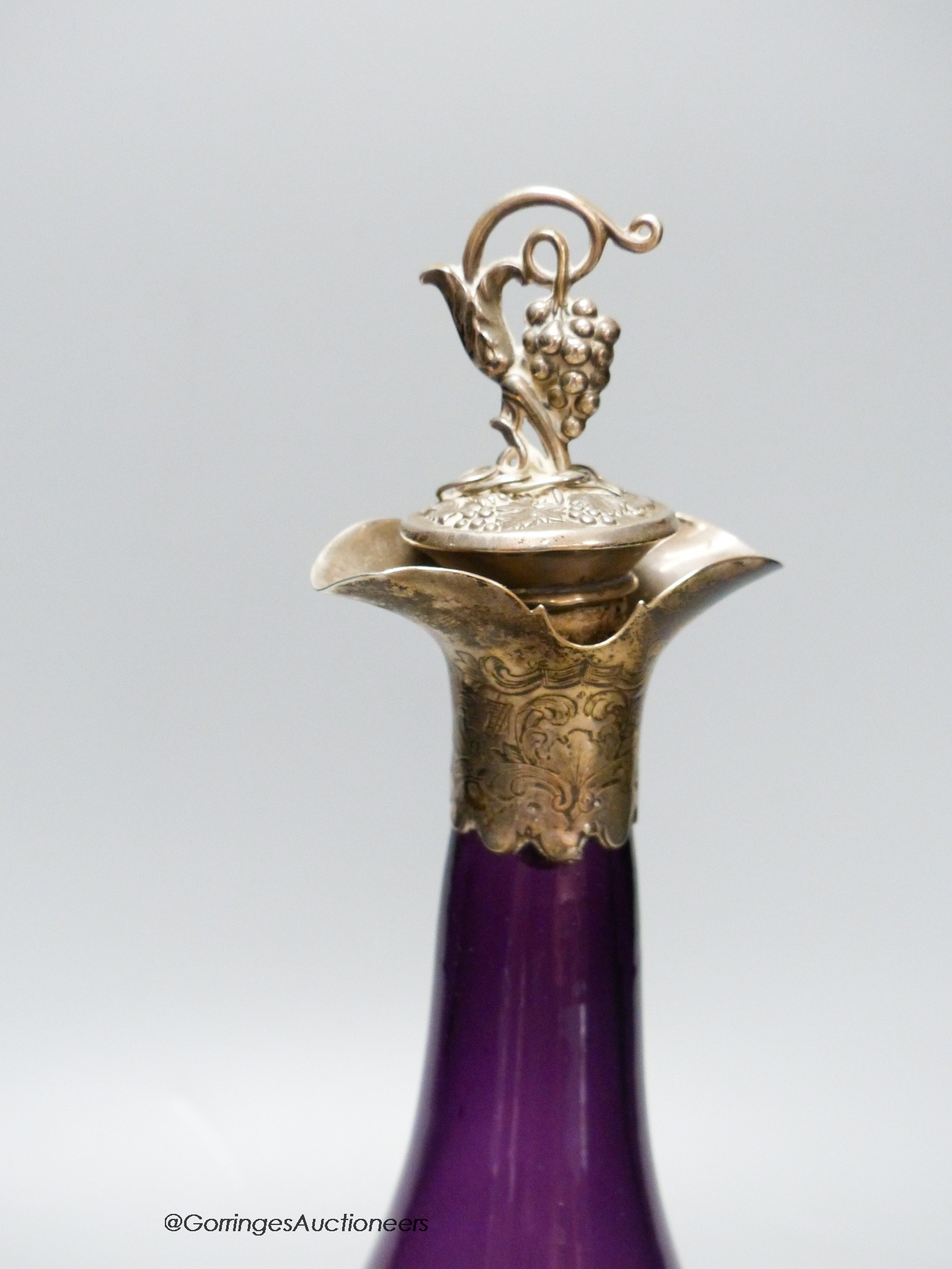 A Victorian silver mounted amethyst glass decanter, height 31cm